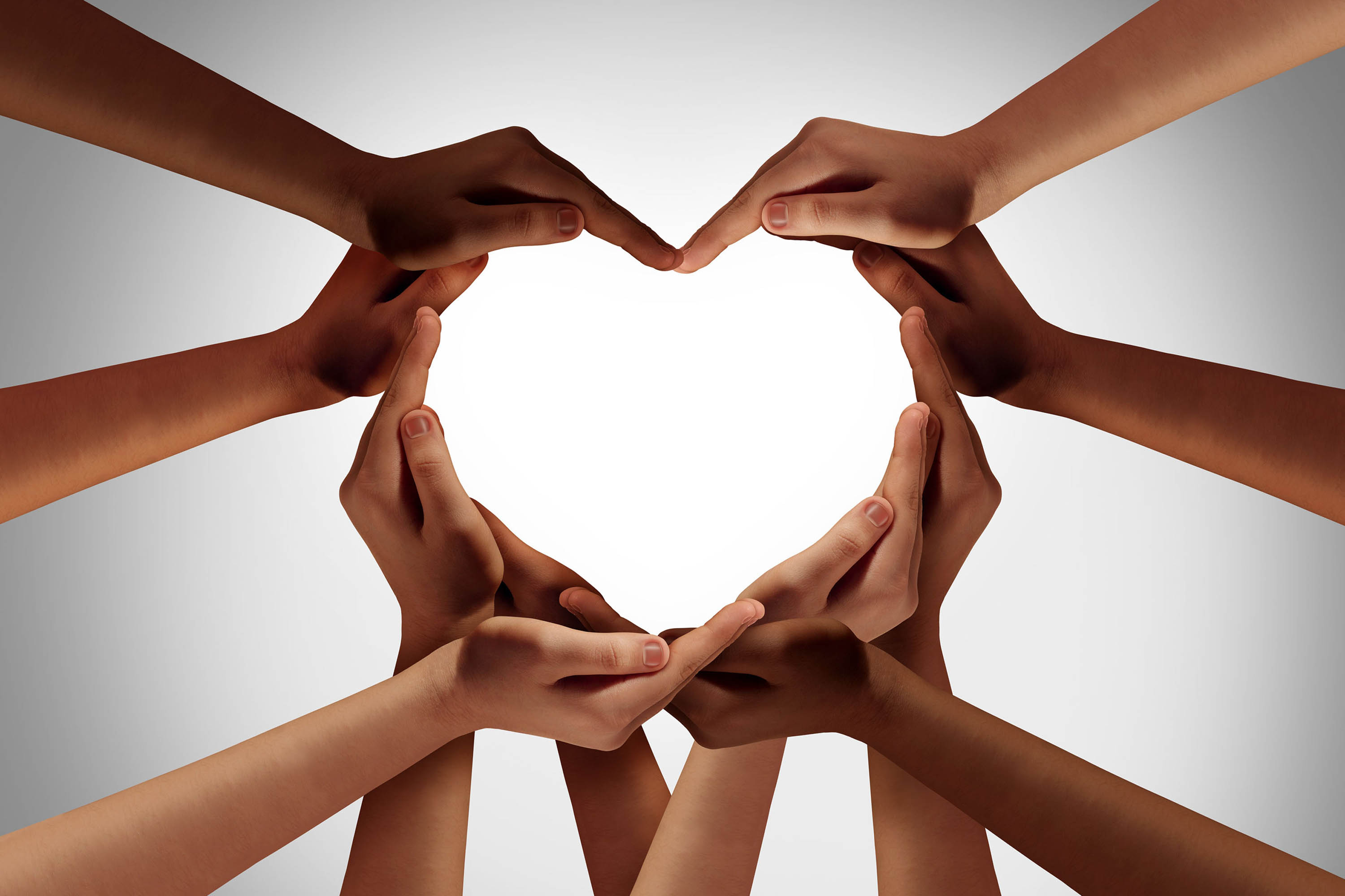 Hände, die ein Herz bilden